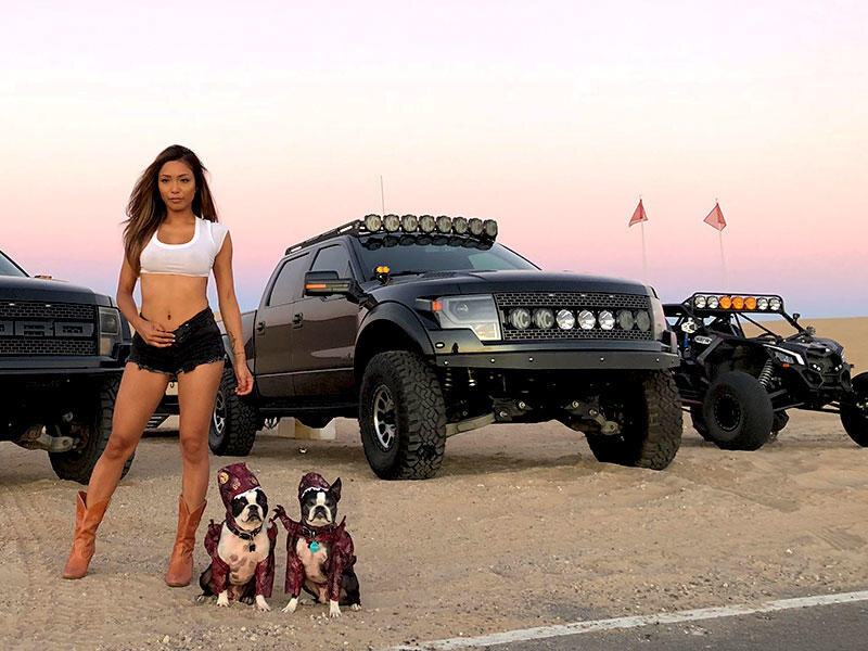 Picture of Gen 1 Raptor and X3 with cute girl and pups